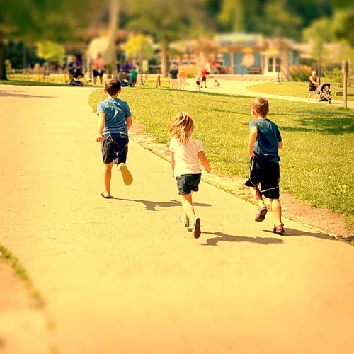 Album art for For Christine: three children running down a sunny path