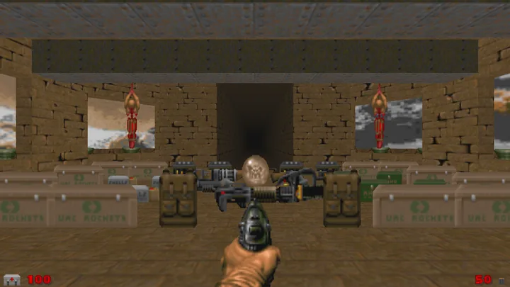 A brick room lined with torches and weapon pickups